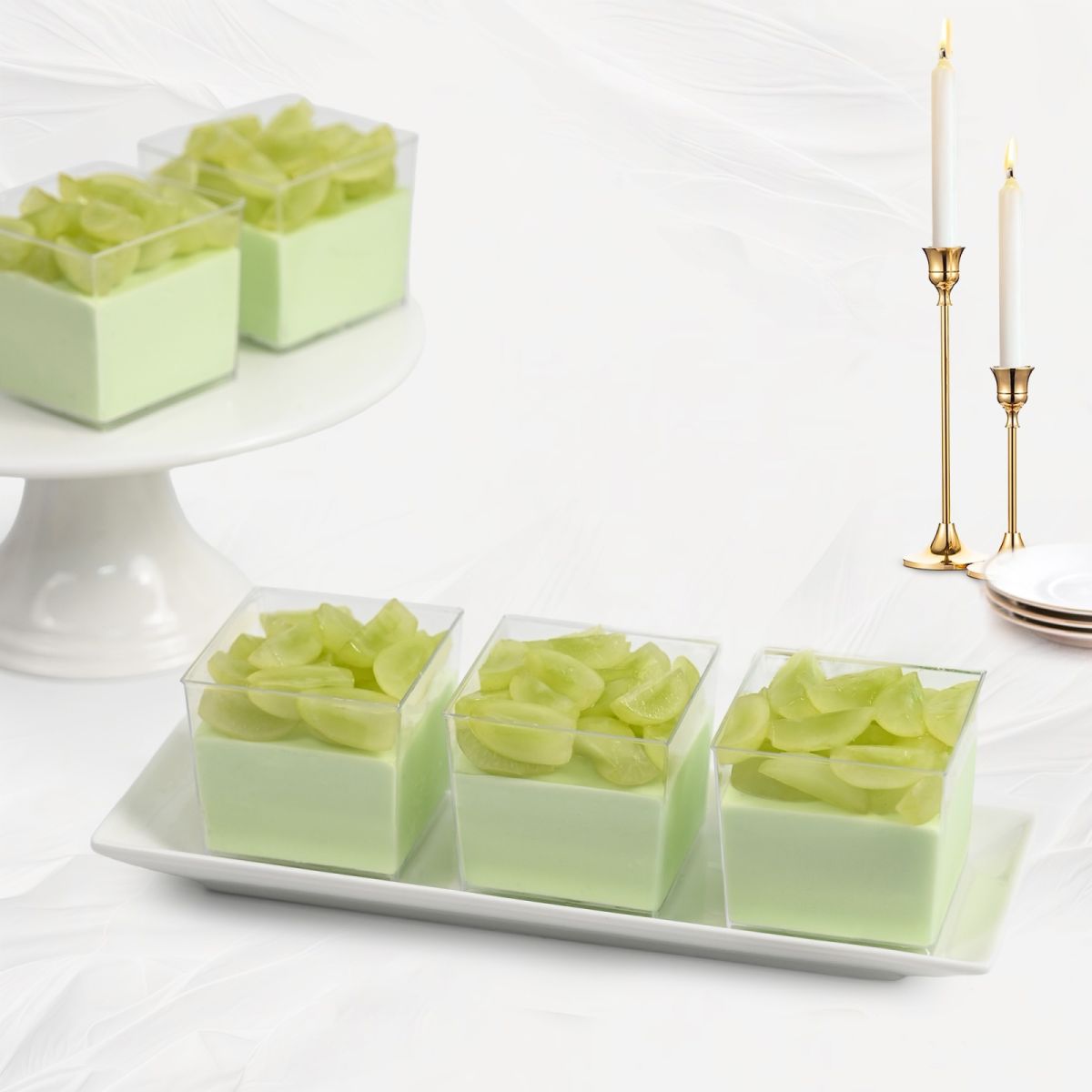 Mousse mini dạng ly tại Tiệm Bánh Kim Loan với 12 hương vị gồm dưa lưới, xoài, dâu tây, matcha, chanh dây, socola, tiramisu phô mai, bơ, bưởi hồng, việt quất, dừa dứa và táo xanh, phù hợp phục vụ Tea Break và sự kiện.
