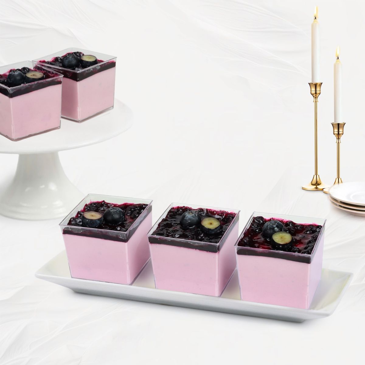 Mousse mini dạng ly tại Tiệm Bánh Kim Loan với 12 hương vị gồm dưa lưới, xoài, dâu tây, matcha, chanh dây, socola, tiramisu phô mai, bơ, bưởi hồng, việt quất, dừa dứa và táo xanh, phù hợp phục vụ Tea Break và sự kiện.